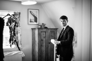 Groom getting ready for Cotswolds wedding