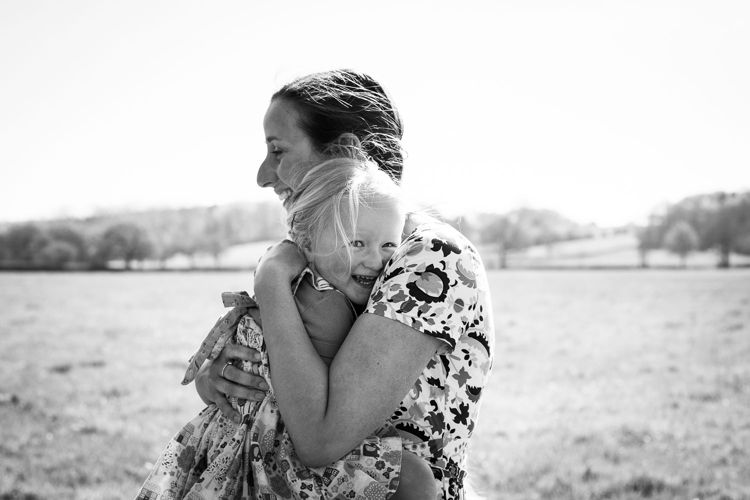 Photo of mum hugging daughter